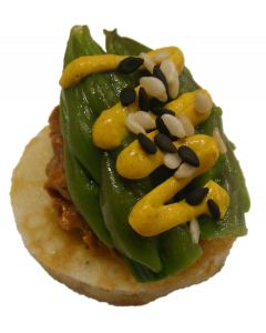 Asparagus and sundried tomato sesame seeds on blinis